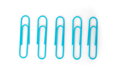 multicolored paper clips on a white background close-up