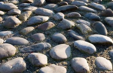 Obraz premium Flußsteine Pflaster