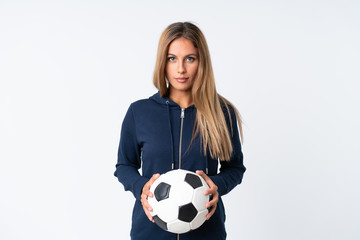 Young football player woman over isolated white background