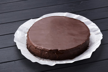 Prague Cake. Cake on the table. Prague chocolate cake on plate. chocolate brownie cake dessert. Free space for text