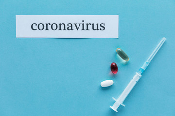 Obraz premium Coronavirus 2019 n-Cov concept. Medicines for Coronavirus and tablet on color background
