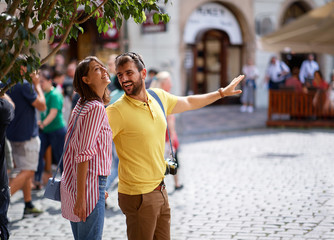  couple in love traveling,europe vacation,happy positive mood, smiling,  having fun.