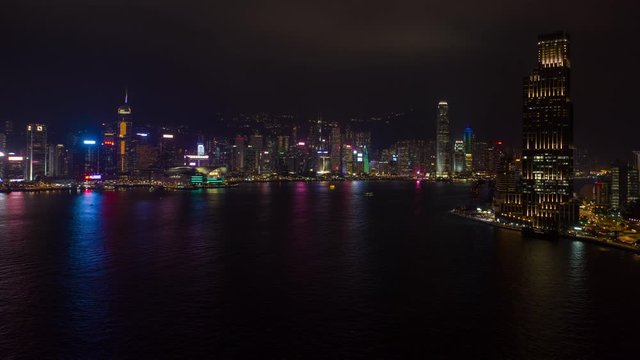 Aerial China Time Lapse 12045-48 Hong Kong Downtown Night September 2019 4K  Aerial time lapse video of downtown Hong Kong on the waterfront at night. 