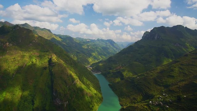 Ma Pi Leng Pass, road over mountain line and river flow among range mountain, North of Vietnam., Time-Lapse.