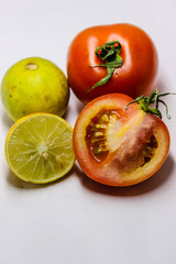 A picture of fresh lemon with tomatos