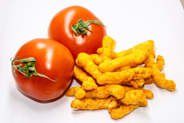 A picture of cookies with tomatos