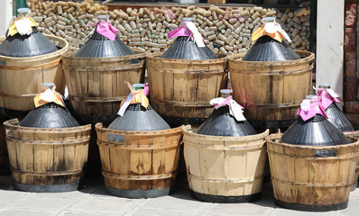 Fototapeta premium Eight big demijohns also called carboys