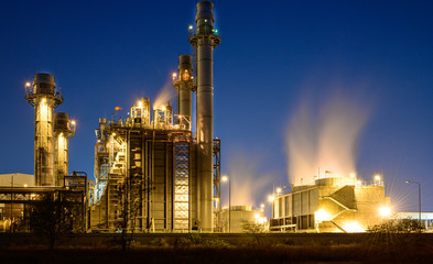 Obraz na płótnie Canvas Glow light of petrochemical industry on sunset and Twilight sky ,Power plant,Energy power station area