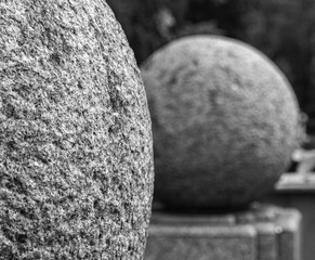 Rough surface of stone ball in black and white tone with copy space.