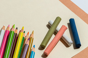 Colored pencils and pastel on a landscape sheet in warm color