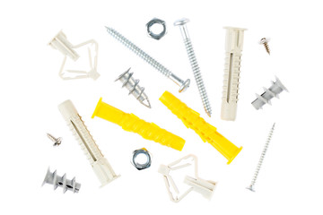 Set of different types of plastic and metal fasteners, isolated on white background