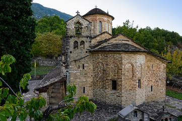 Fototapeta na wymiar View of the greek-orthodox Church of the Holy Apostles in the village of Molivdoskepastos, in Epirus, Greece