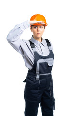 A female civil engineer looks into the distance. Isolated