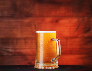 full mug of beer with foam