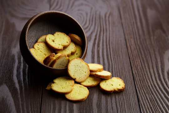 Bruschette chips, grilled bread, beer snacks in a bowl