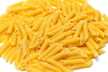 yellow Italian pasta made from durum wheat on a white background