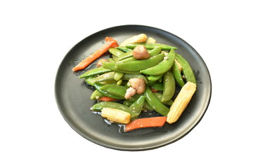 stir fried garden pea with straw mushroom and baby corn on dish