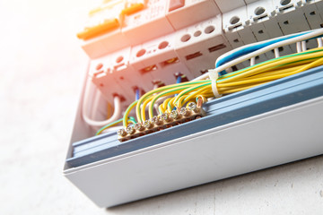 Close up elements copper wires consumer electric control panel switchboard enclosure for...