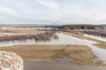 spring flooding in the Russian village. Typical phenomenon during the spring season in Russia. selective focus