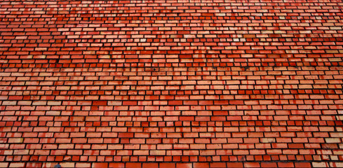 Yellow-red brick wall. The texture of red bricks.