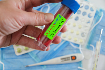 medical masks, pills and thermometer