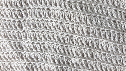 Light gray knitted texture, fiber photo background. Fashion pattern modern, backdrop surface empty color