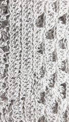 Light coloured knitted texture, fiber photo background. Fashion pattern modern, backdrop surface empty color