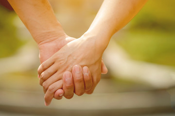 Men and women shake hands with love on valentines day