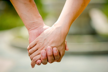 Men and women shake hands with love on valentines day