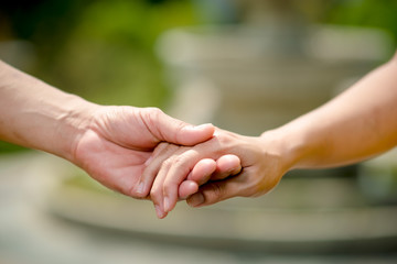 Men and women shake hands with love on valentines day