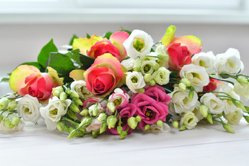 Valentine card.Template greeting card for Valentine's Day with white eustomas and pink roses. Spring card for Mother's Day, Women's Day. Copy space. Congratulations on wedding or anniversary. March 8