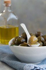 Green olives and olive oil, healthy eating, cooking ingredients