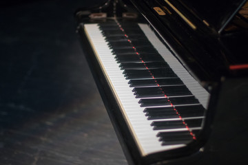 Piano on stage in a theater. Art. Performance. Classical music. Concert.  