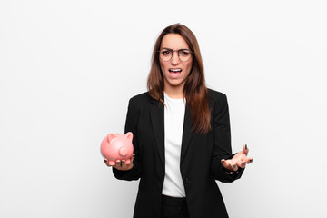 young businesswoman looking angry, annoyed and frustrated screaming wtf or what‚Äôs wrong with...