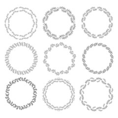 Set of 9 isolated plant wreaths. Vector linear hand drawing on a white background.