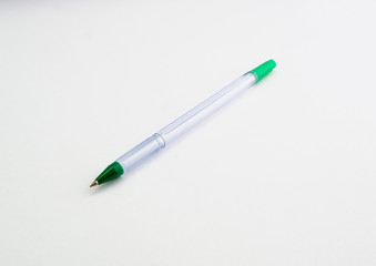 glass ballpoint pen on white background