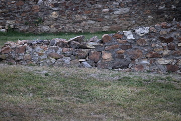 crumbling stone wall