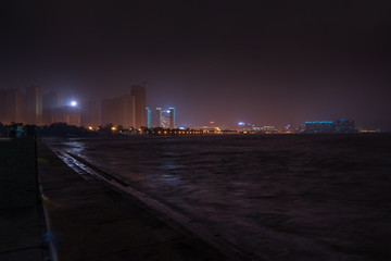 Night embankment. City quay landscape in Weihai.