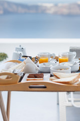 continental Breakfast on the hotel's terrace overlooking the sea and the Caldera , the best place to stay on the most romantic island of Greece, Santorini