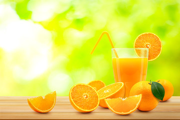 Stack of fresh orange fruit on wooden.