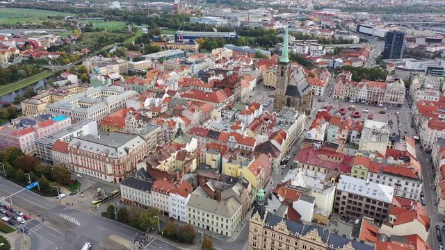 Aerial view of historical centre of Plzen in autumn day overlooking Gothic spire of medieval Cathedral