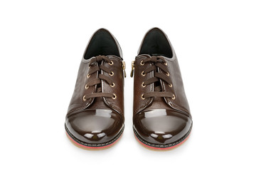 Woman's lacquered loafer shoes Isolated on the white background.