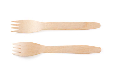 Eco-friendly materials. Wooden, disposable spoon on a white background.