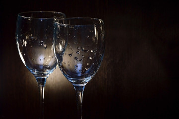 Stylish glass goblets for an evening party or holiday. Items that create a romantic atmosphere