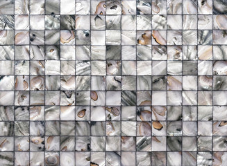 Mother of pearl mosaic tiles. Tile from pieces of pearl shell.