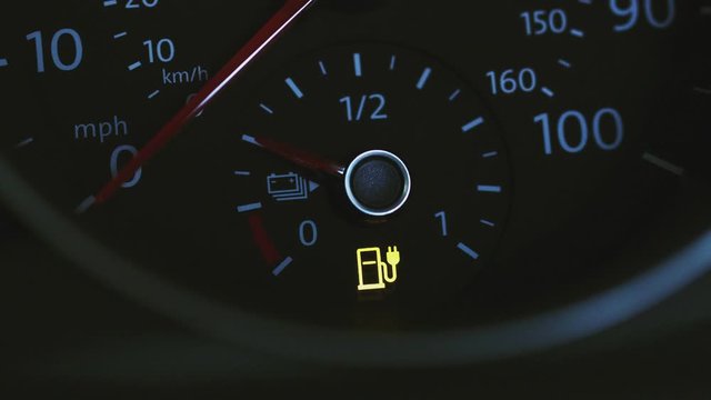 Close Up Of Dial Showing Charge Remaining In Electric Car Motor