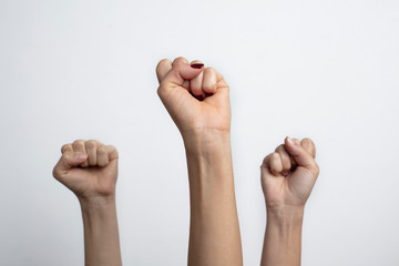 Together we stand ! Many clenched fists punch air energetically