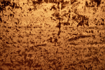 Golden velvet cloth texture background. Top view.