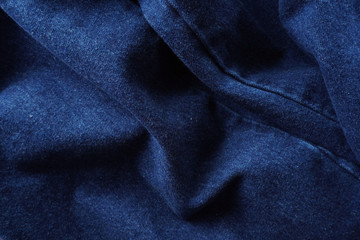 Jeans background. Denim jeans texture. Blue denim pattern.