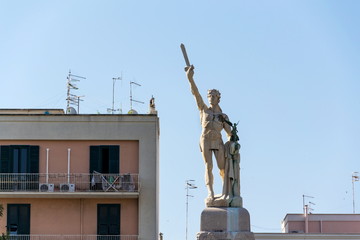 Fototapeta premium Victor Emmanuel II of Italy statue, king of Sardinia and united Italy, blue clear sky background